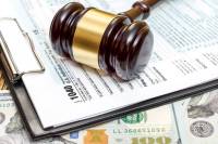 Judge gavel 1040 form money iStock x8zjkP