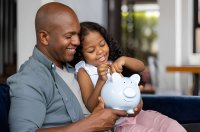 Man child piggy bank iStock mZSHda
