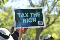 Tax the Rich sign Unsplash eINJ50