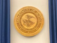 Justice Department logo TNS NO RESTRICTIONS a7zcpK