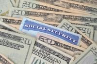 Social security card in pile of money 600x400 1  56203e8912487 xoXcQO